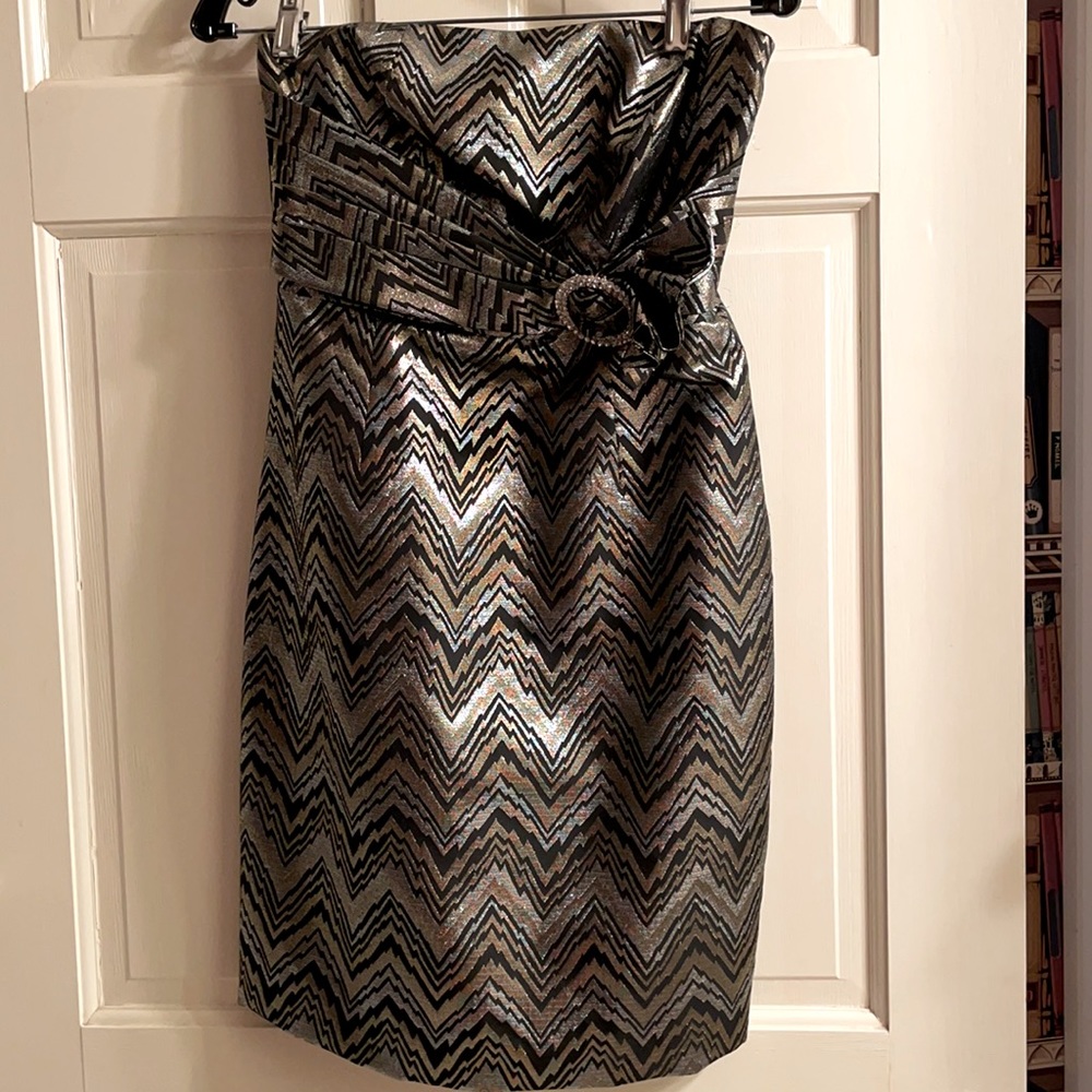 Gorgeous backless dress. Black, silver, gold, photographs well! Great for NYE!
